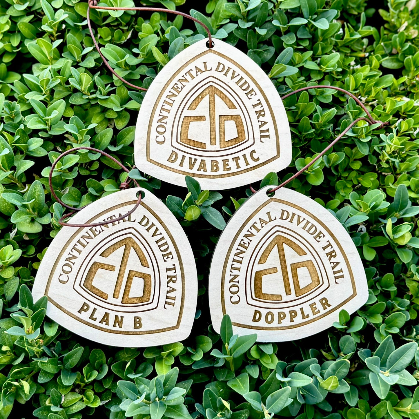 Personalized Continental Divide Trail backpack tag engraved with hiker’s trail name. Lightweight reclaimed wood gear, perfect CDT thru-hiker gift, trail angel surprise, or hiking ornament. Eco-friendly and handmade in the Pacific Northwest.
