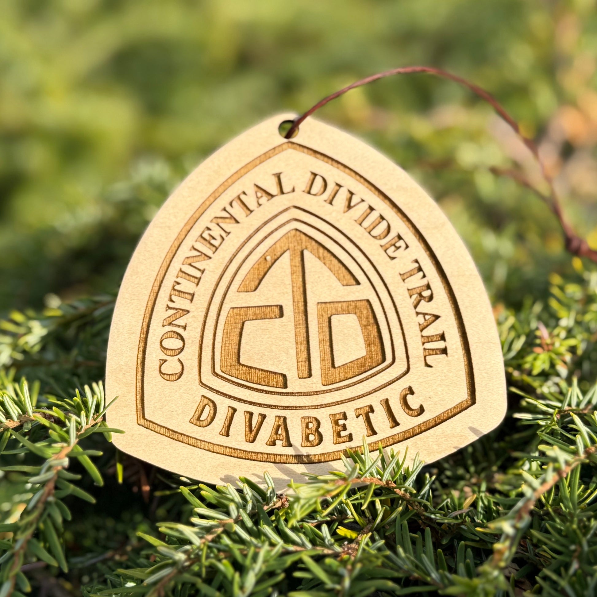 Personalized Continental Divide Trail backpack tag engraved with hiker’s trail name. Lightweight reclaimed wood gear, perfect CDT thru-hiker gift, trail angel surprise, or hiking ornament. Eco-friendly and handmade in the Pacific Northwest.