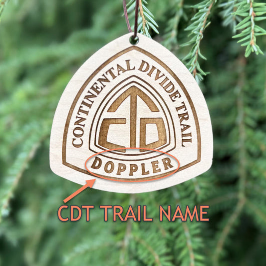 Personalized Continental Divide Trail backpack tag engraved with hiker’s trail name. Lightweight reclaimed wood gear, perfect CDT thru-hiker gift, trail angel surprise, or hiking ornament. Eco-friendly and handmade in the Pacific Northwest.