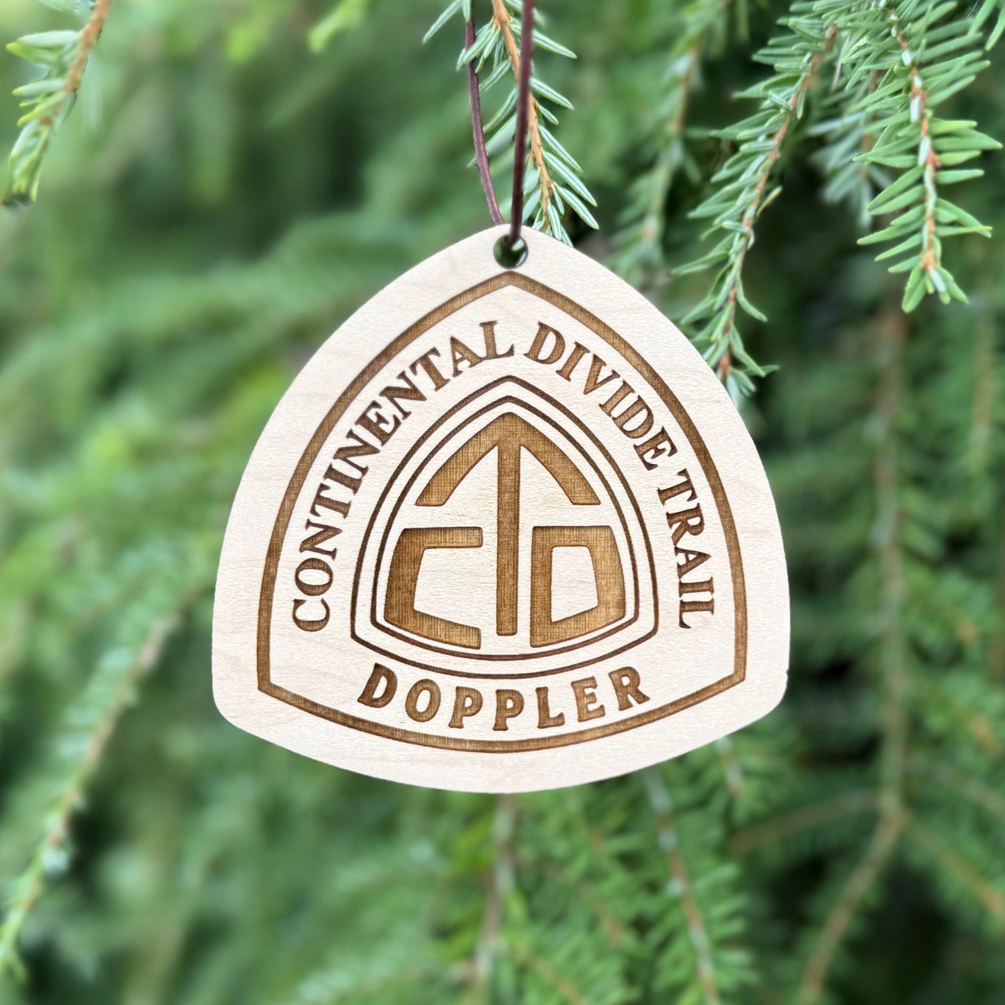 Personalized Continental Divide Trail backpack tag engraved with hiker’s trail name. Lightweight reclaimed wood gear, perfect CDT thru-hiker gift, trail angel surprise, or hiking ornament. Eco-friendly and handmade in the Pacific Northwest.