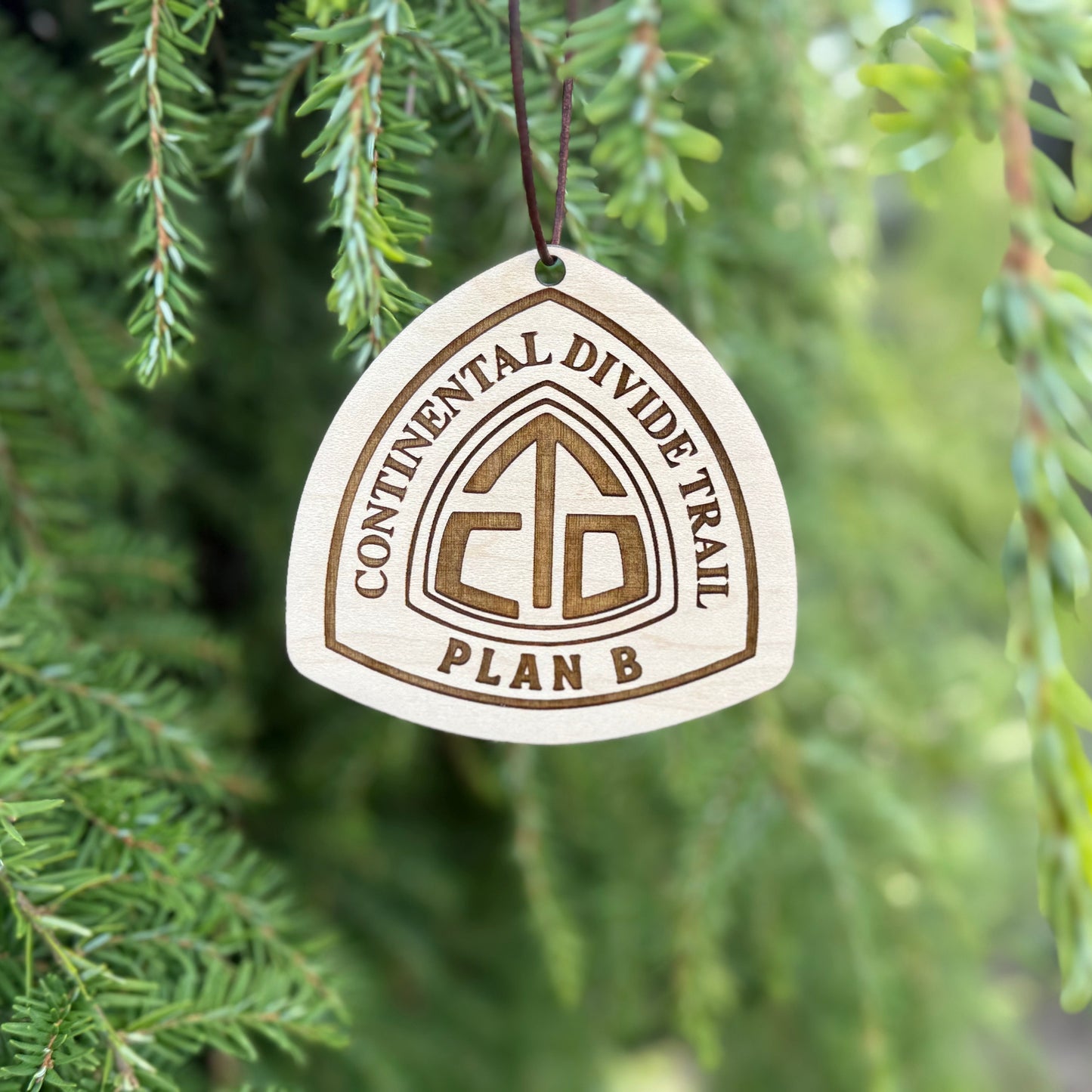 Personalized Continental Divide Trail backpack tag engraved with hiker’s trail name. Lightweight reclaimed wood gear, perfect CDT thru-hiker gift, trail angel surprise, or hiking ornament. Eco-friendly and handmade in the Pacific Northwest.