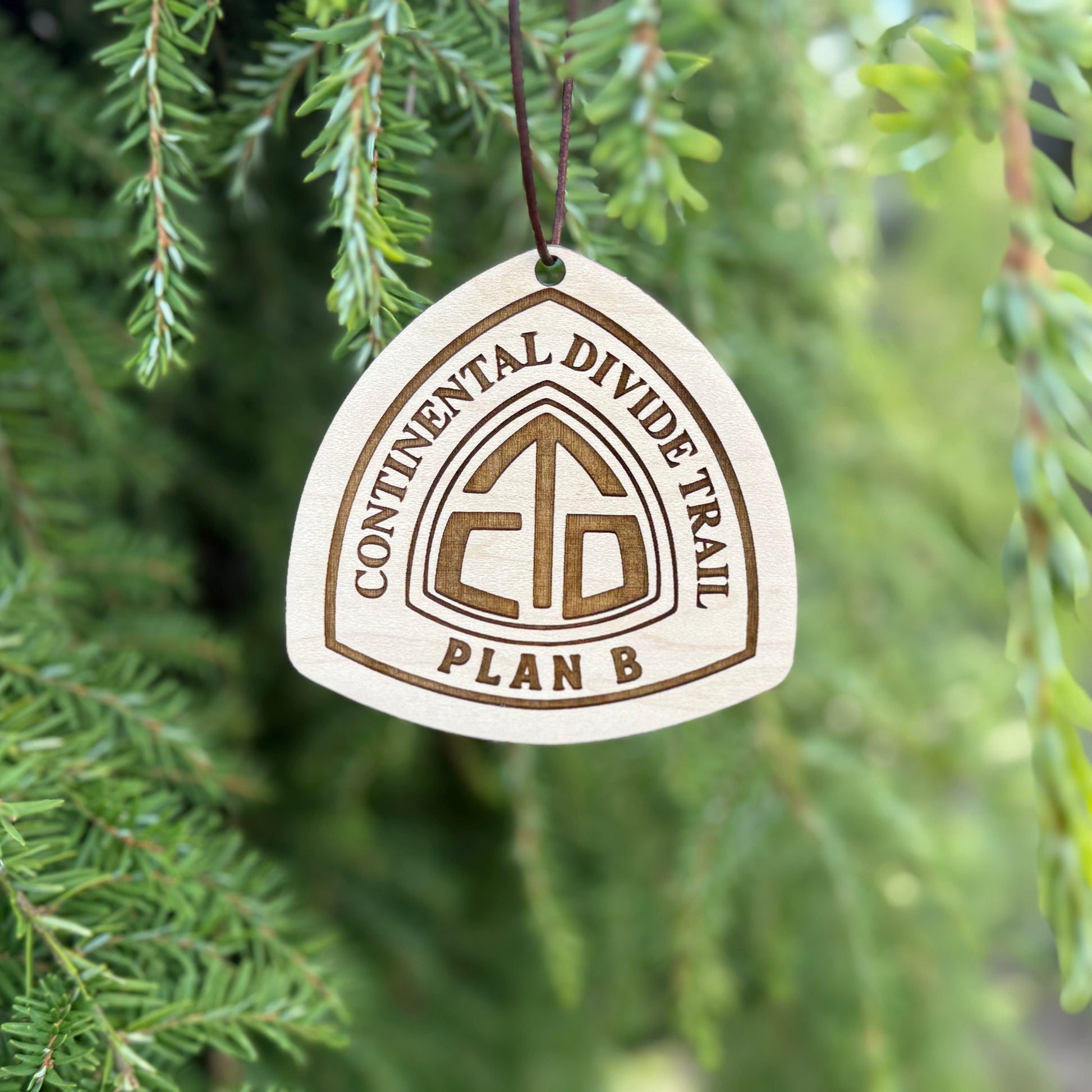 Personalized Continental Divide Trail backpack tag engraved with hiker’s trail name. Lightweight reclaimed wood gear, perfect CDT thru-hiker gift, trail angel surprise, or hiking ornament. Eco-friendly and handmade in the Pacific Northwest.