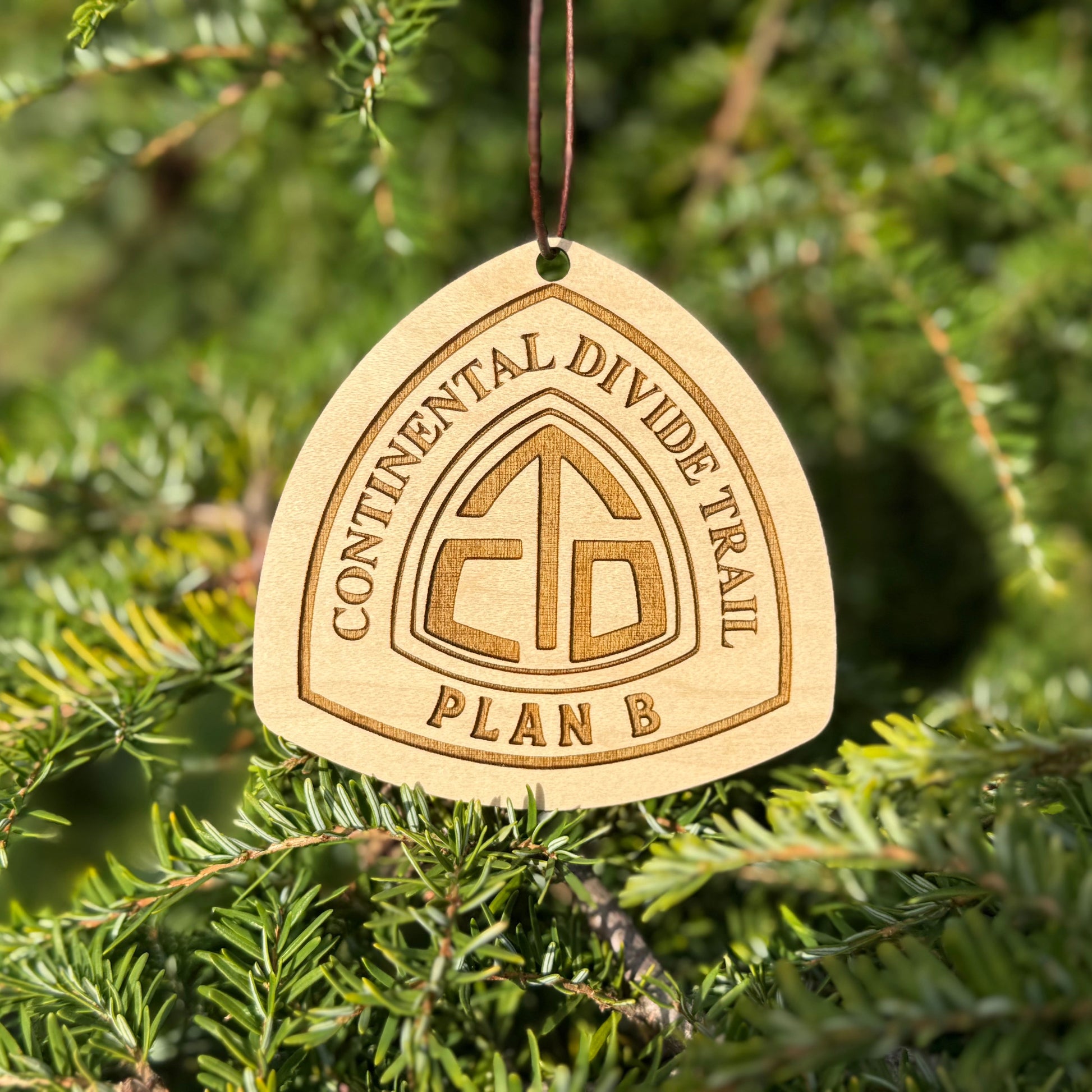 Personalized Continental Divide Trail backpack tag engraved with hiker’s trail name. Lightweight reclaimed wood gear, perfect CDT thru-hiker gift, trail angel surprise, or hiking ornament. Eco-friendly and handmade in the Pacific Northwest.