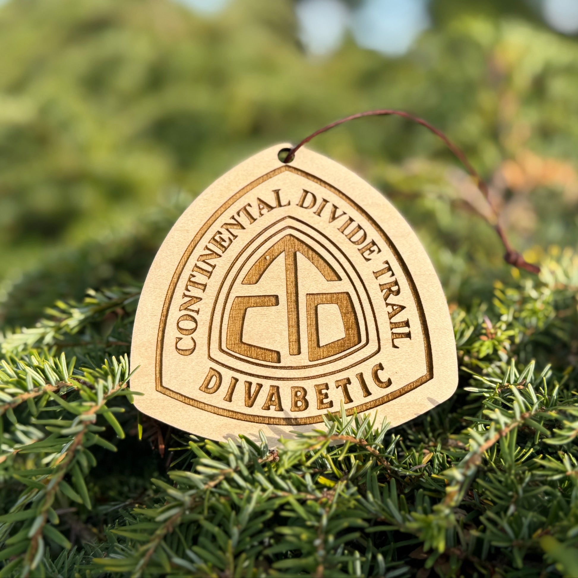 Personalized Continental Divide Trail backpack tag engraved with hiker’s trail name. Lightweight reclaimed wood gear, perfect CDT thru-hiker gift, trail angel surprise, or hiking ornament. Eco-friendly and handmade in the Pacific Northwest.