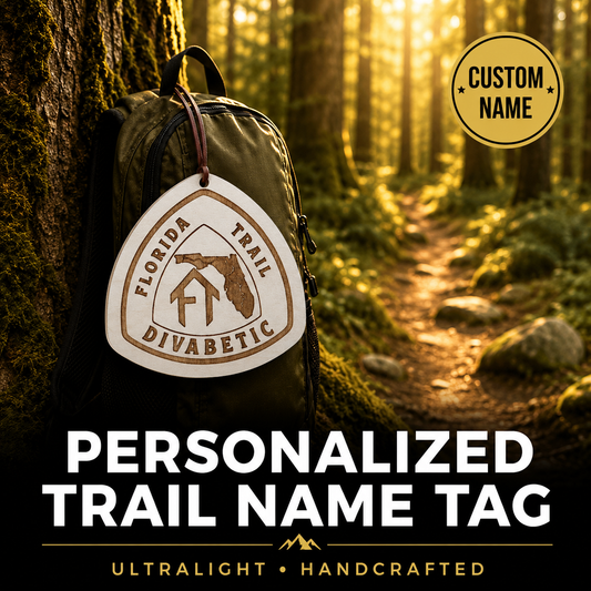 Backpack with a Florida Trail Divabetic name tag in a forest setting