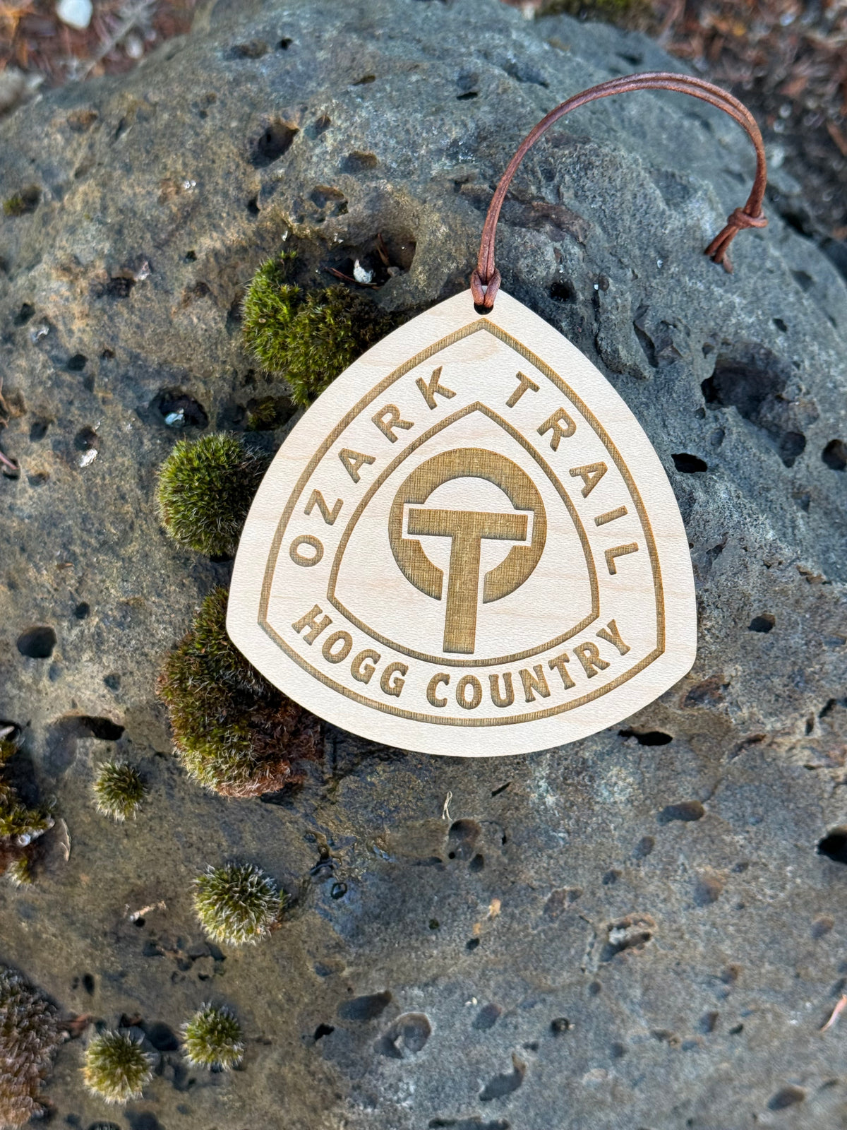 Ozark Trail thru-hiker gift featuring a personalized wooden backpack tag with custom trail name for Missouri hiking adventures